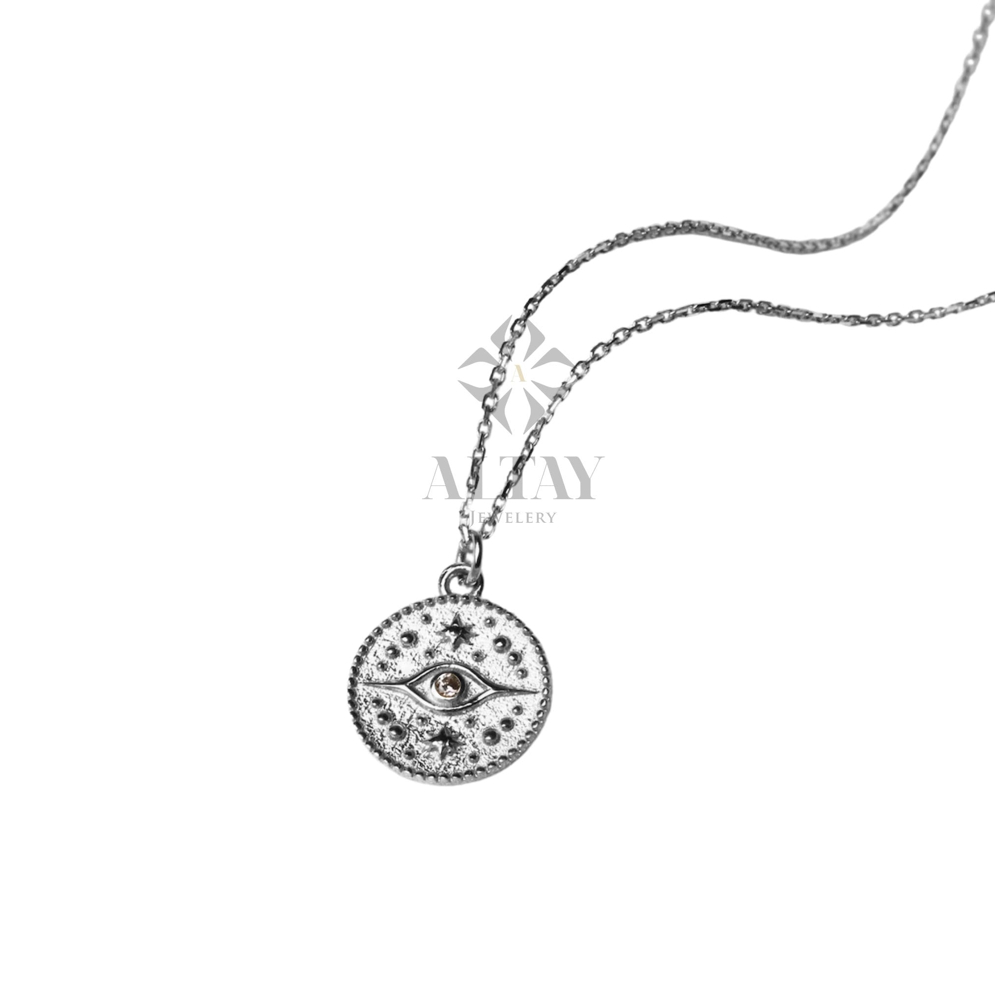 white medallion evil eye