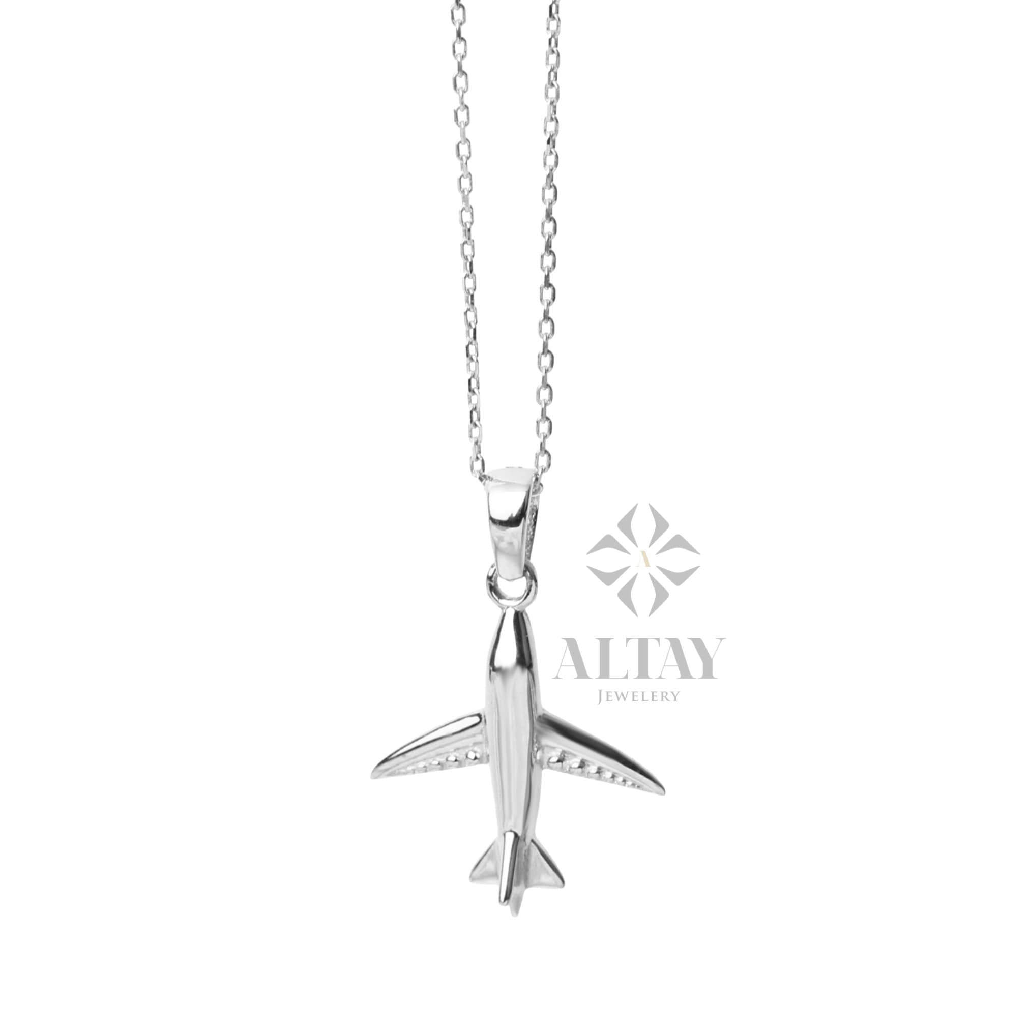 white gold airplane charm